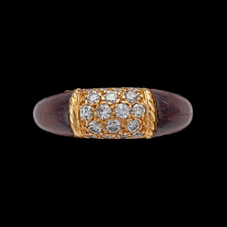 A van Cleef & Arpels diamond and wood ring.