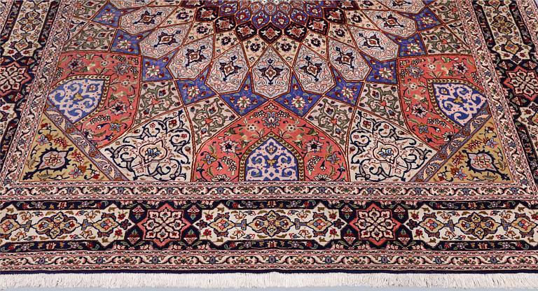 A Tabriz carpet, part silk, so-called 50 Raj, approx. 255 x 200 cm.