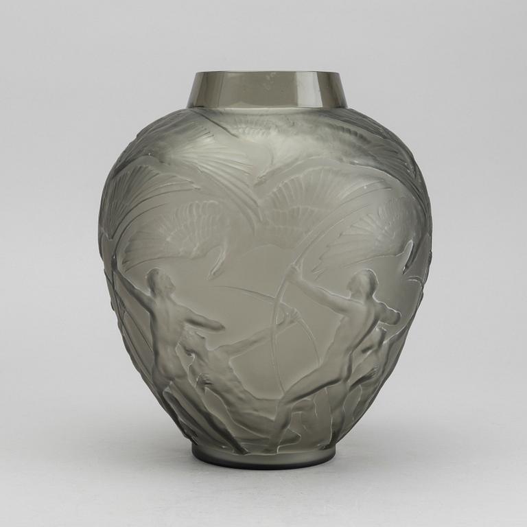 René Lalique, an "Archers" moulded smoke-coloured glass vase, model nr 893, France, post 1921.