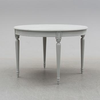 A second half of the 20th century Gustavian style dining table.