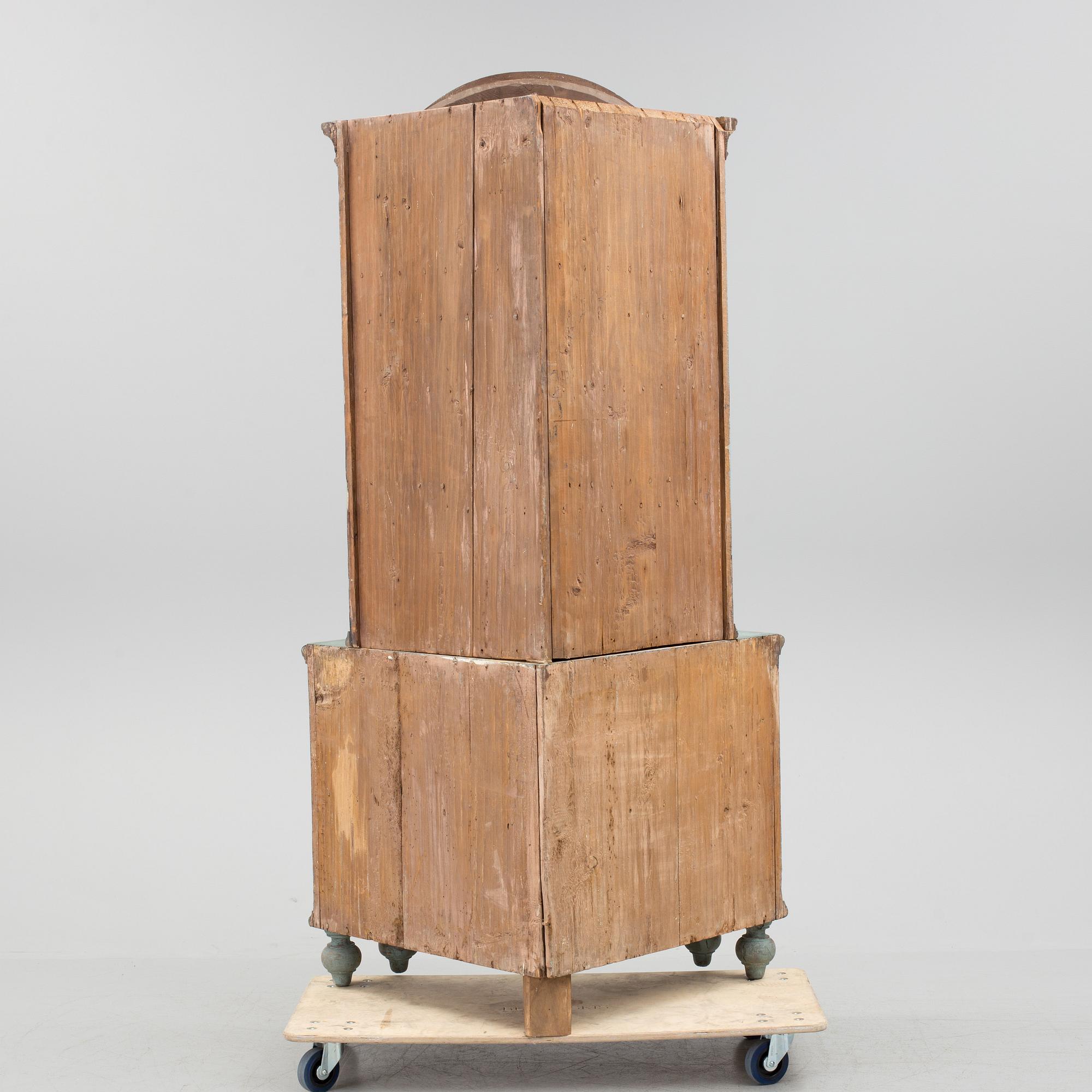 A 18th century corner cabinet.