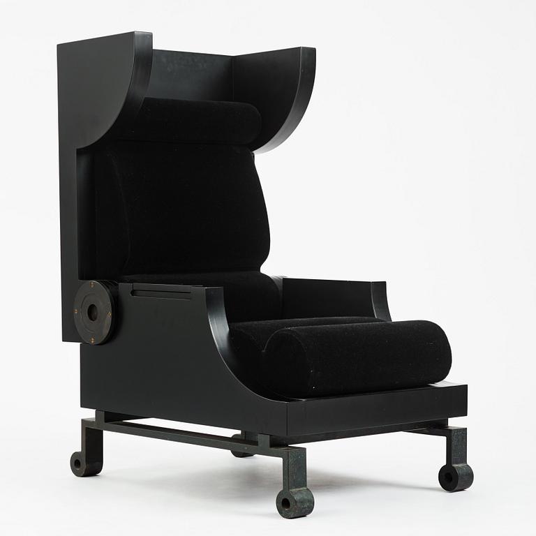 Alexander H Damsbo & Henrik Ingemann Nielsen, a "HC-Andersen Chair" armchair/table, ed. 3/49, Källemo, post 2005.