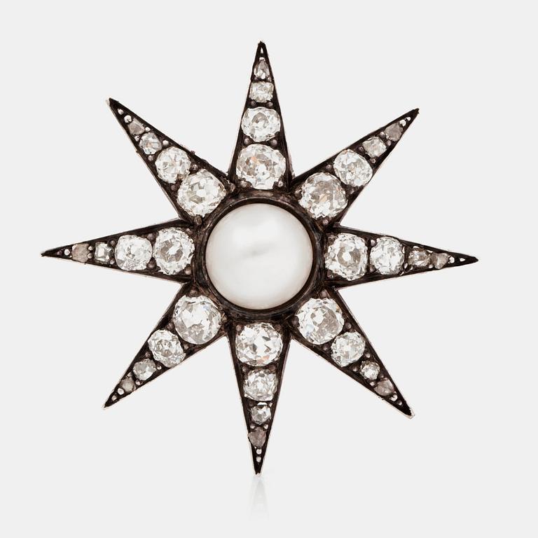 A late Victorian old cut diamond and probably natural pearl brooch in the shape of a star.