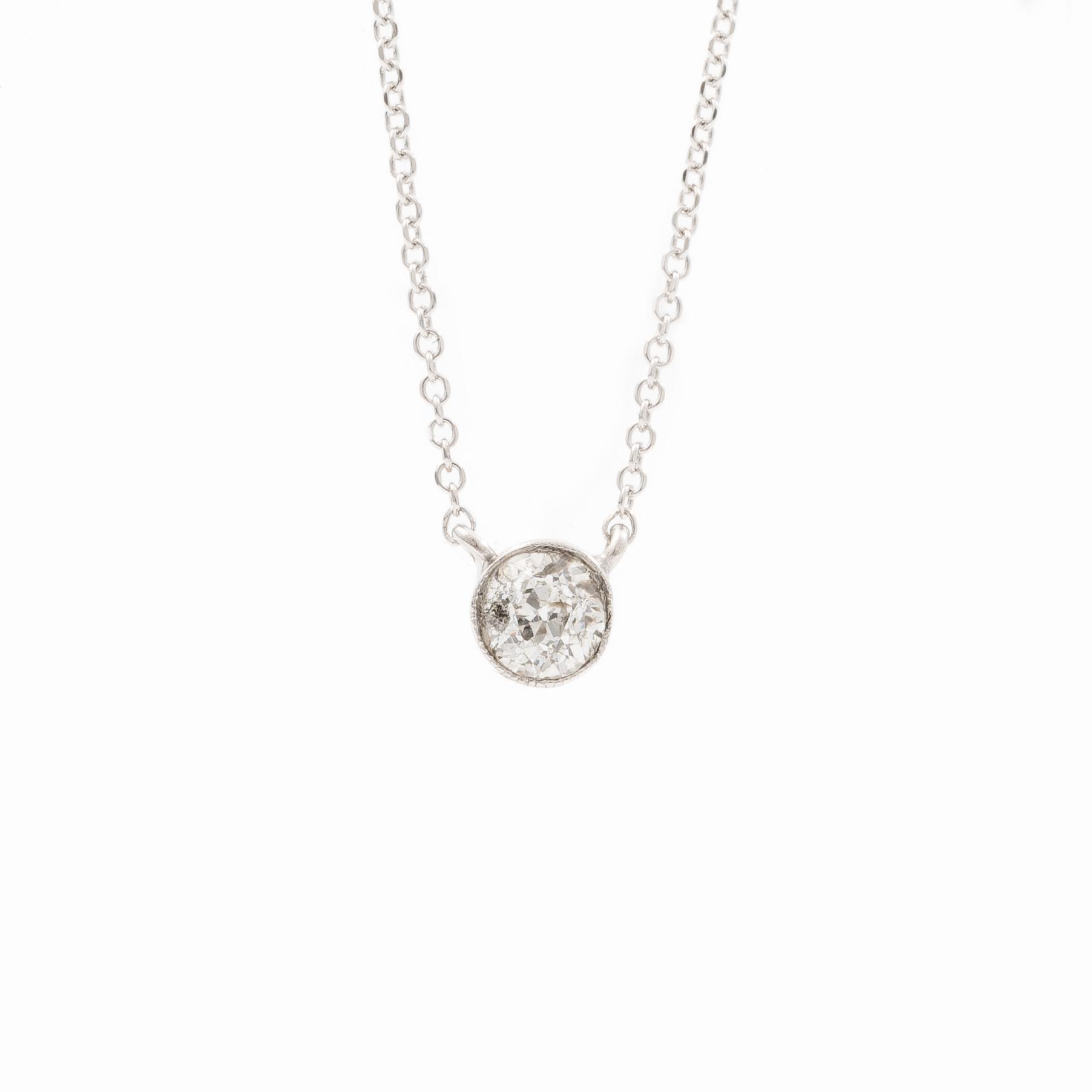 Necklace 18K white gold with an old-cut diamond.