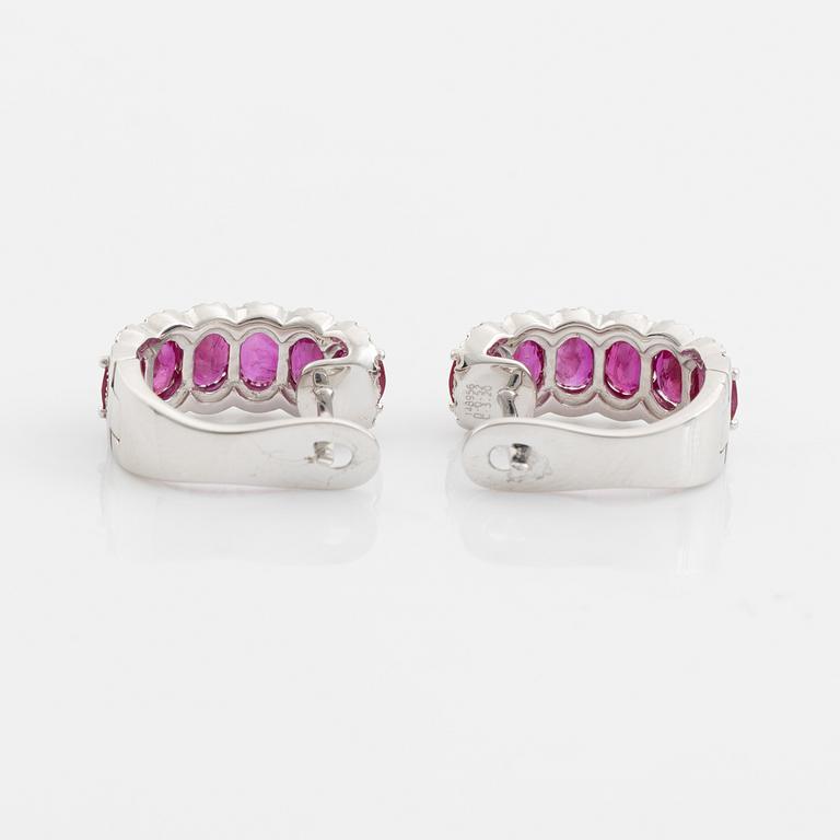Earrings with rubies and brilliant-cut diamonds.
