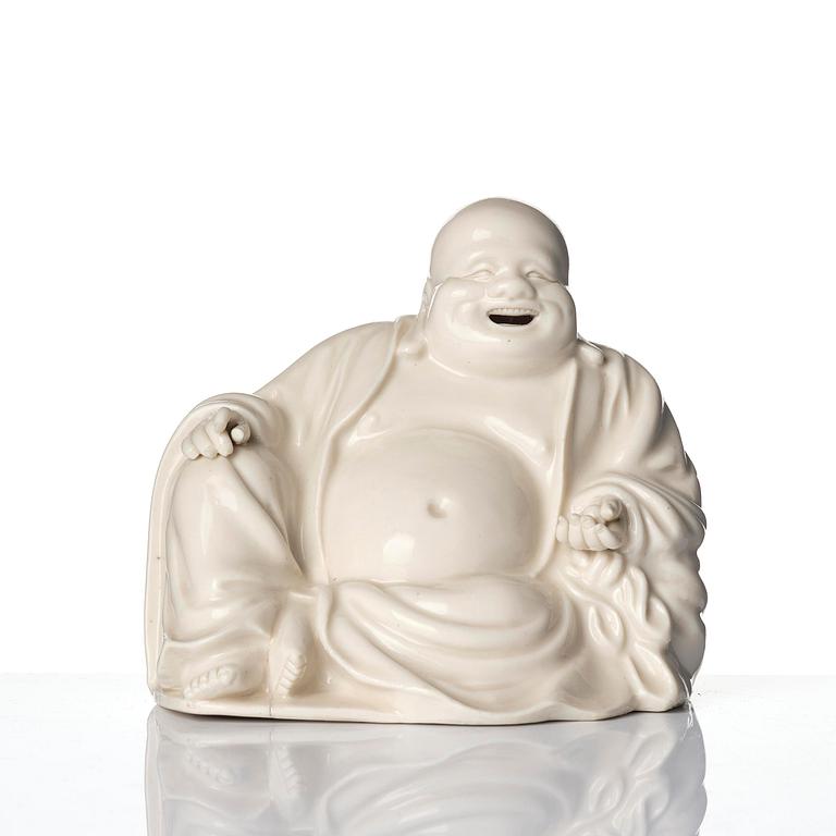 A blanc de chine figure of Budai, Qing dynasty, 18/19th century.