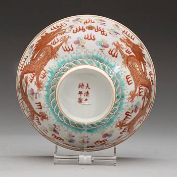 A famille rose dragon bowl, Qing dynasty with Guangxus six characters mark and period.
