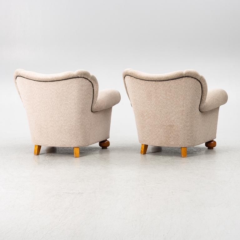A pair of Swedish modern armchairs, first half of the 20th century.