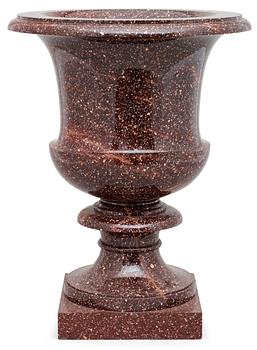 561. A Swedish Empire 19th century porphyry urn.