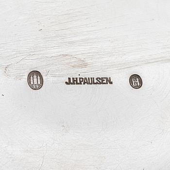 A Danish silver jug and three salt cellars, first half of the 10th Century.