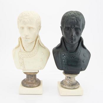 A pair of modern plaster statues of Napoleon.