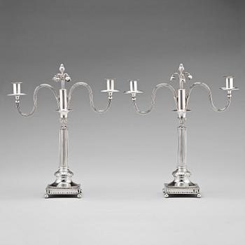 153. A pair of Swedish 18th century silver candleabra,  mark of Pehr Zethelius, Stockholm 1799.