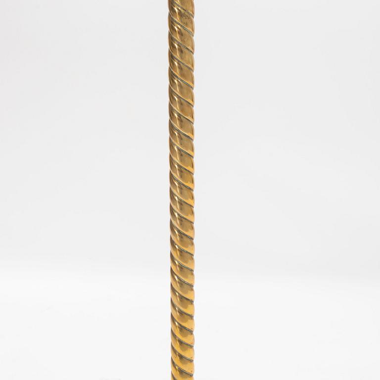 A 1930's brass floor lamp.