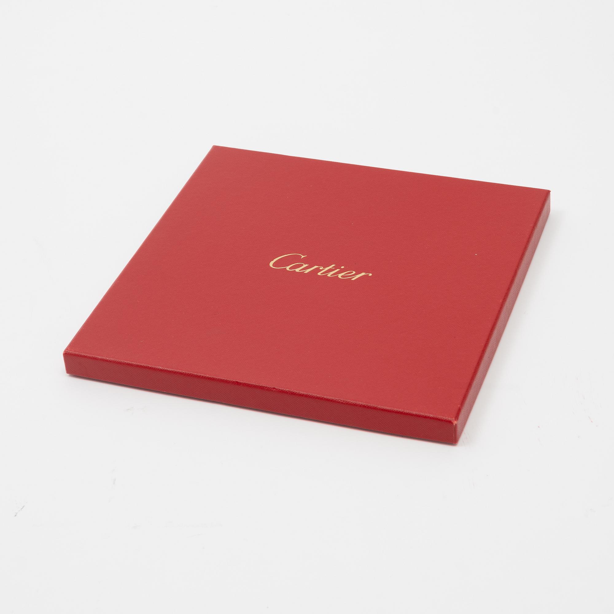 Cartier, a satin silk scarf.