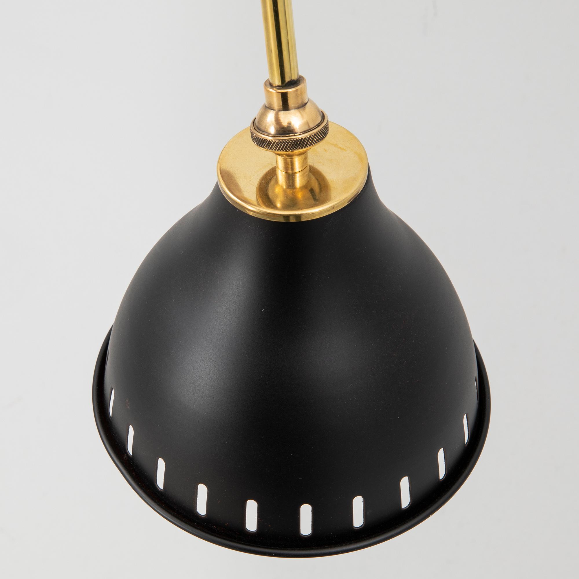 A bras wall lamp later part of the 20th century.