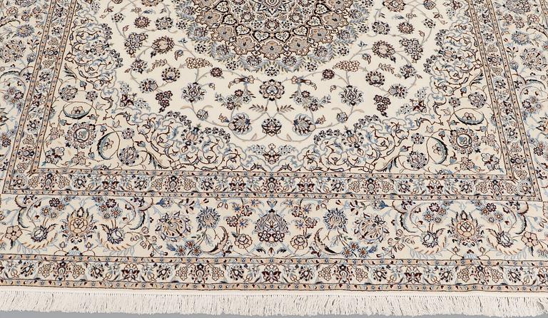 A Nain part silk carpet, 210 x 200 cm.