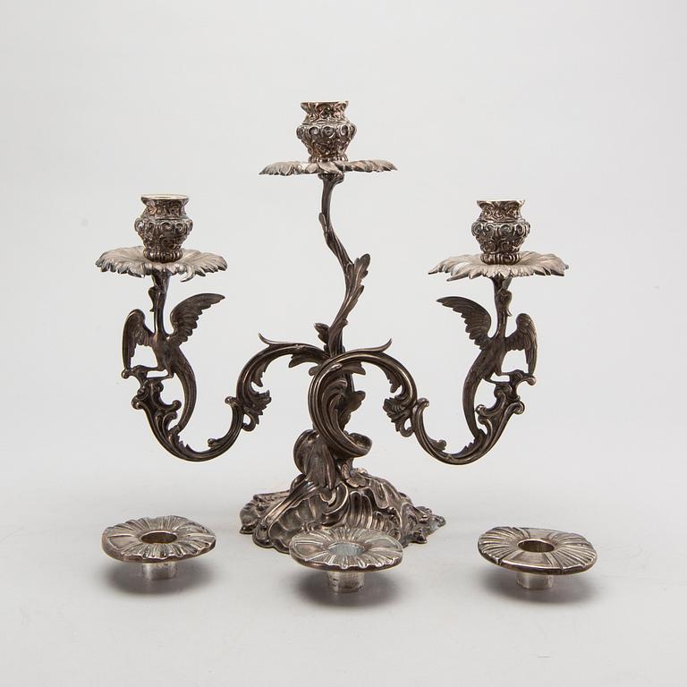 A pair of Swedish silver candelabra mark of GUSTAF MÖLLENBORG Stockholm 1846 , total weight ca 4420 gr, height 31 cm.