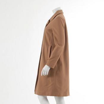 MIU MIU, a beige woolblend coat, italien size 40.