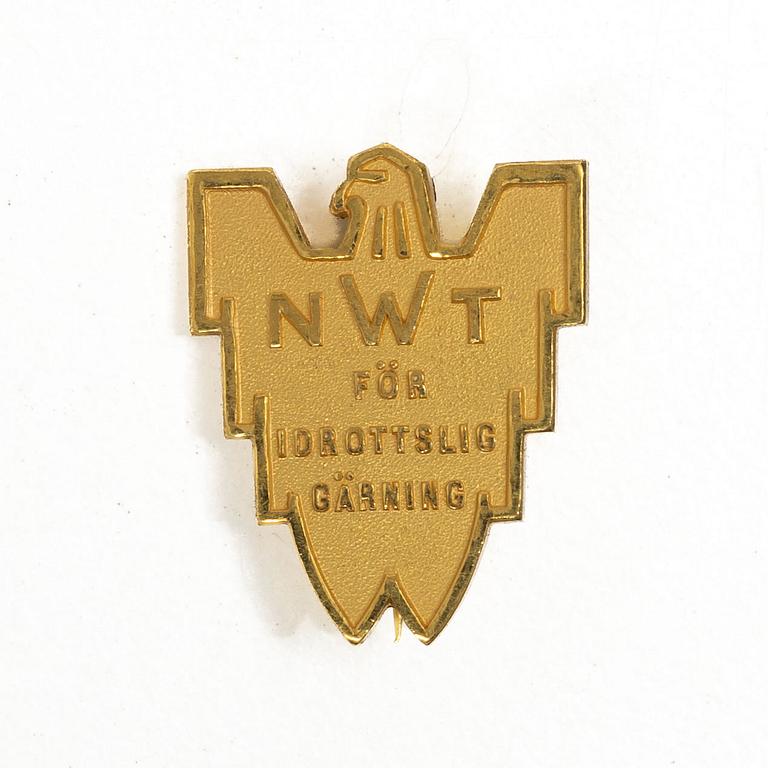 Nya Wermlands-Tidningen’s gold badge for sporting achievement, “NWT-guldet”, pin badge, 18-karat gold.