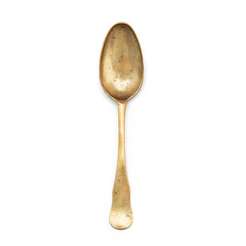 134. A brass (originally silver plated) spoon by Erik Castman.