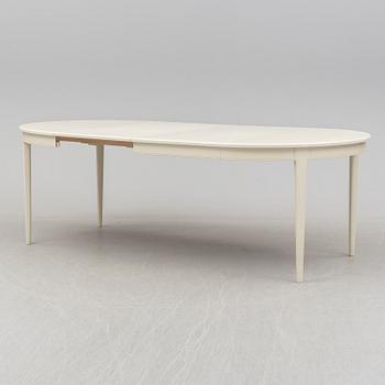A dining table with six chairs by Carl Malmsten, Bodafors, 1960s.