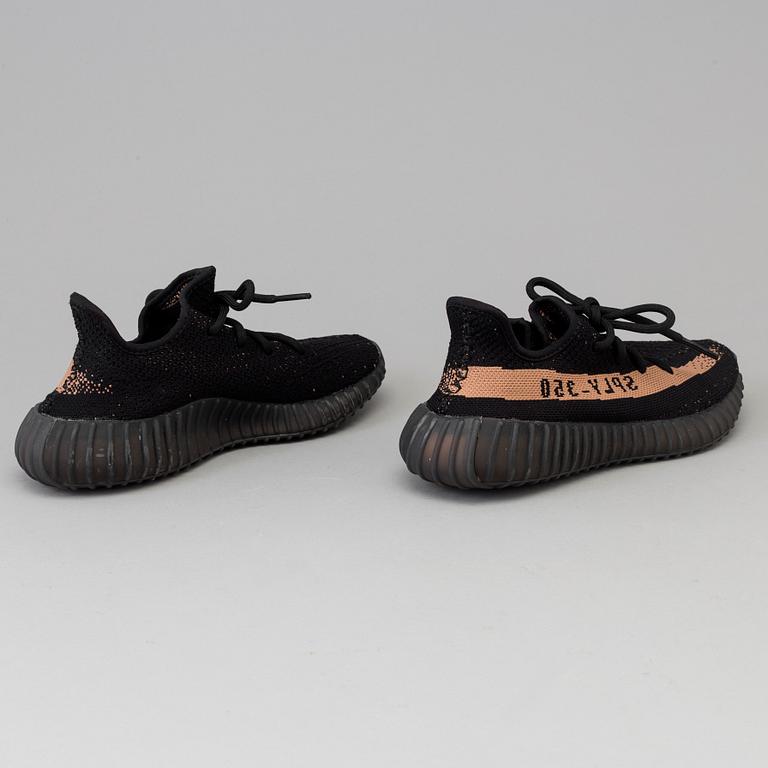 Adidas Yeezy Boost 350 V2 core black copper sneakers.