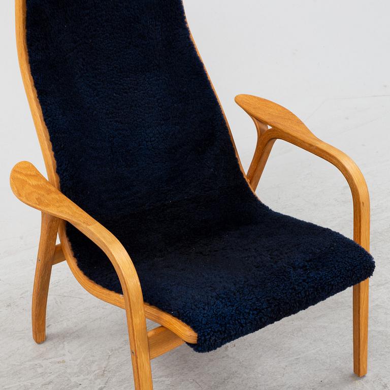 Yngve Ekström, a 'Lamino' armchair with foot stool, Swedese, Sweden, 2007.