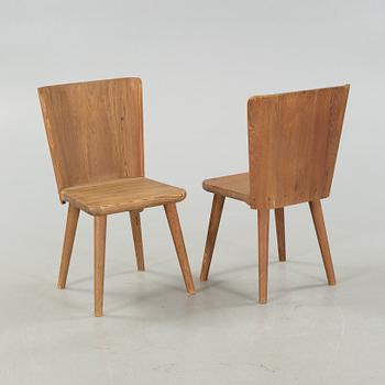 Four chairs, around the mid 20th century.