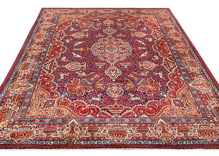 A Kashmar carpet, c. 415 x 285 cm.