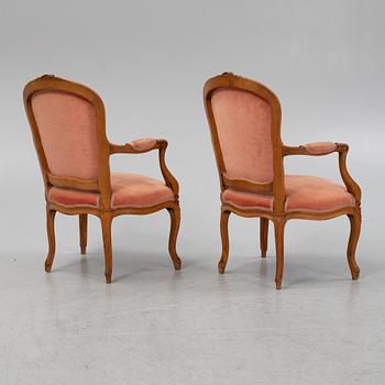 A pair of Louis XVI beechwood armchairs, 18th Century.