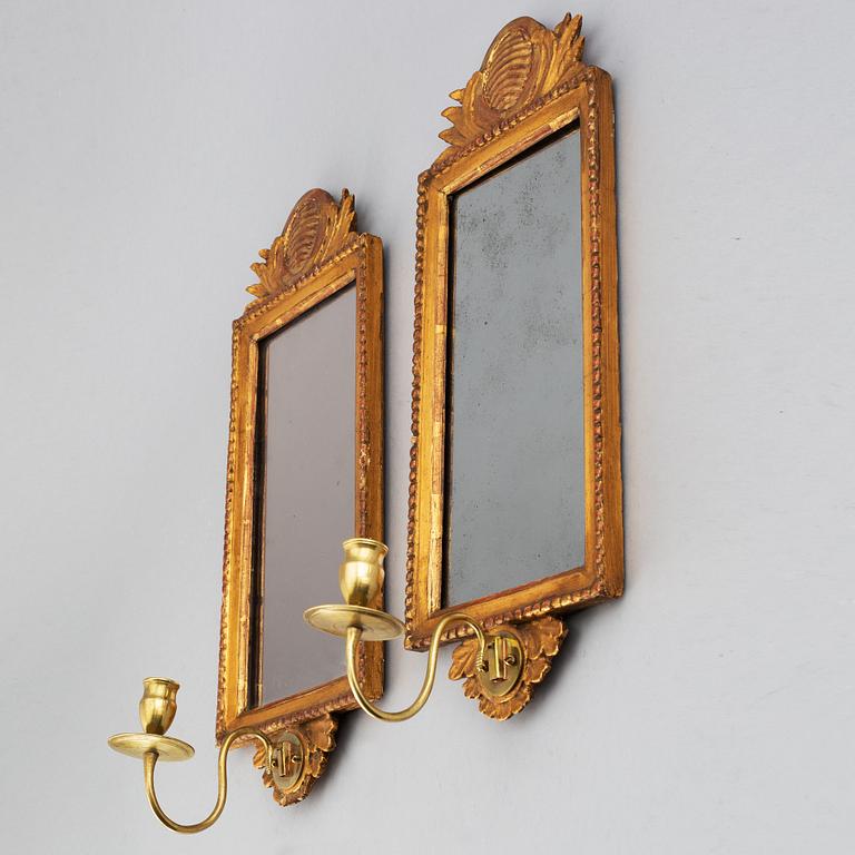 A pair of gustavian style one-light girandole mirrors, late 19th century.