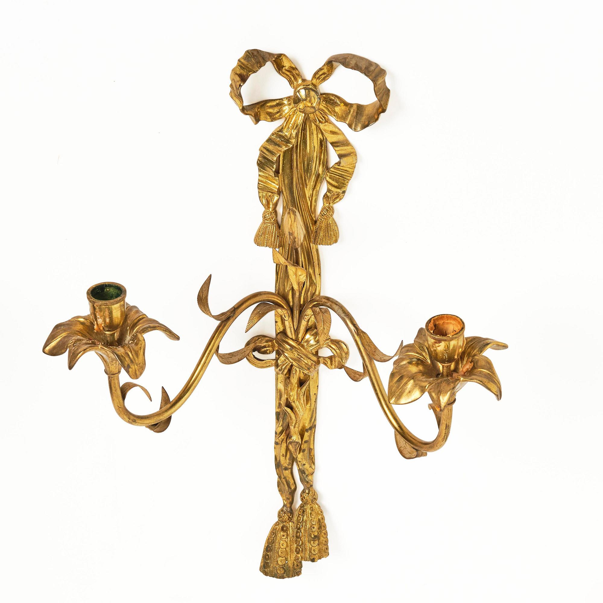 A pair of gilt bronze two-branch appliques after F. L. Rung, late 19th century,