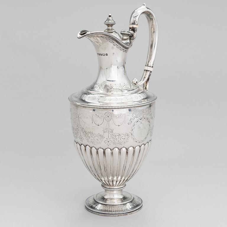 MARTIN, HALL & CO, A sterling silver pitcher, Sheffield 1873.