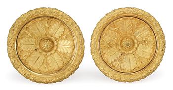 582. A pair of French Empire early 19th century bronzes for curtain rod.