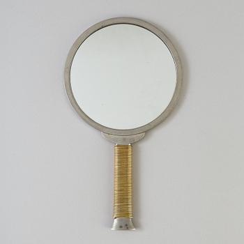 ESTRID ERICSON AND BJÖRN TRÄDGÅRDH, a pewter and brass handmirror from Firma Svenskt Tenn.