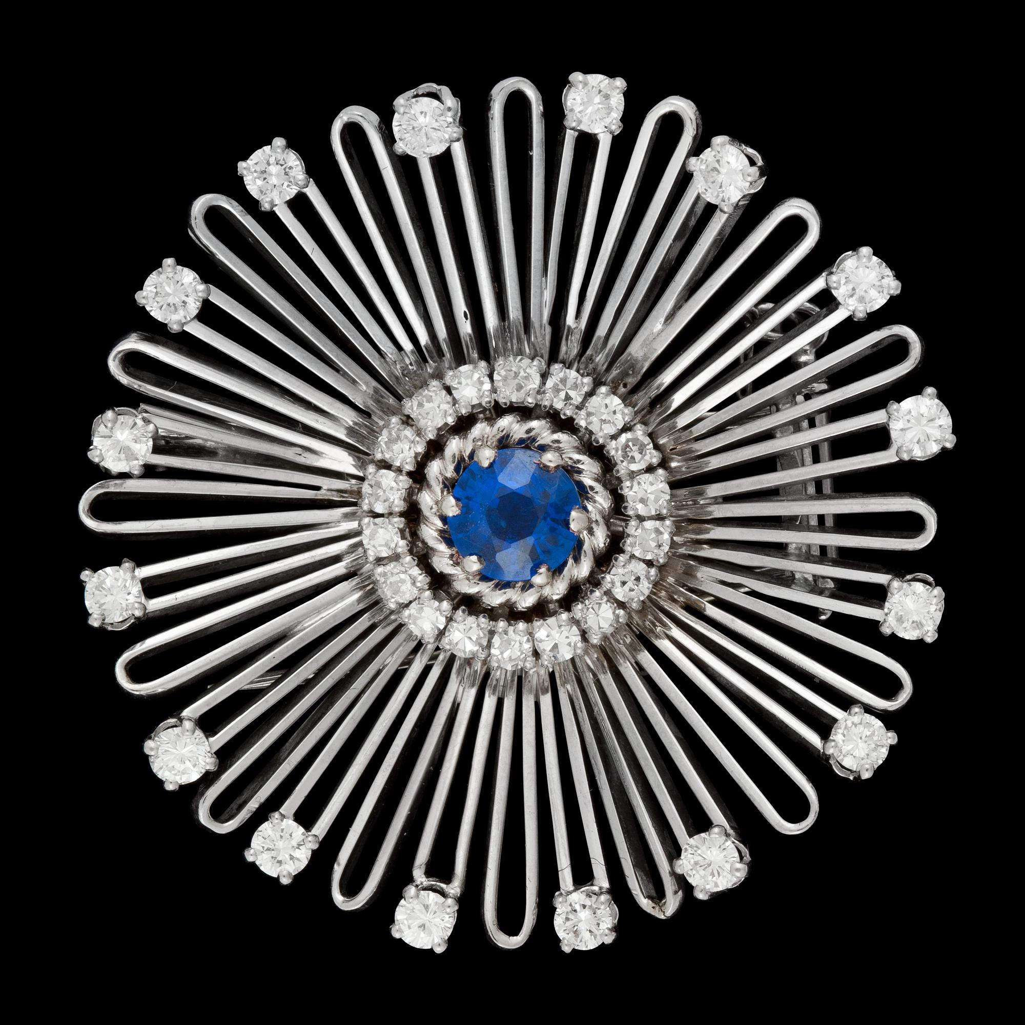BROSCH, blå safir samt briljant- och åttkantslipade diamanter, tot. ca 1.40 ct.