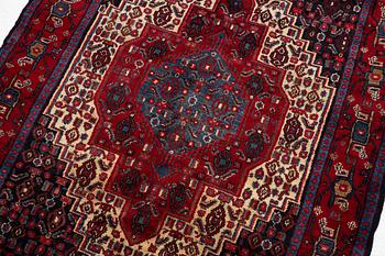 A Senneh rug, a. 159 x 117 cm.