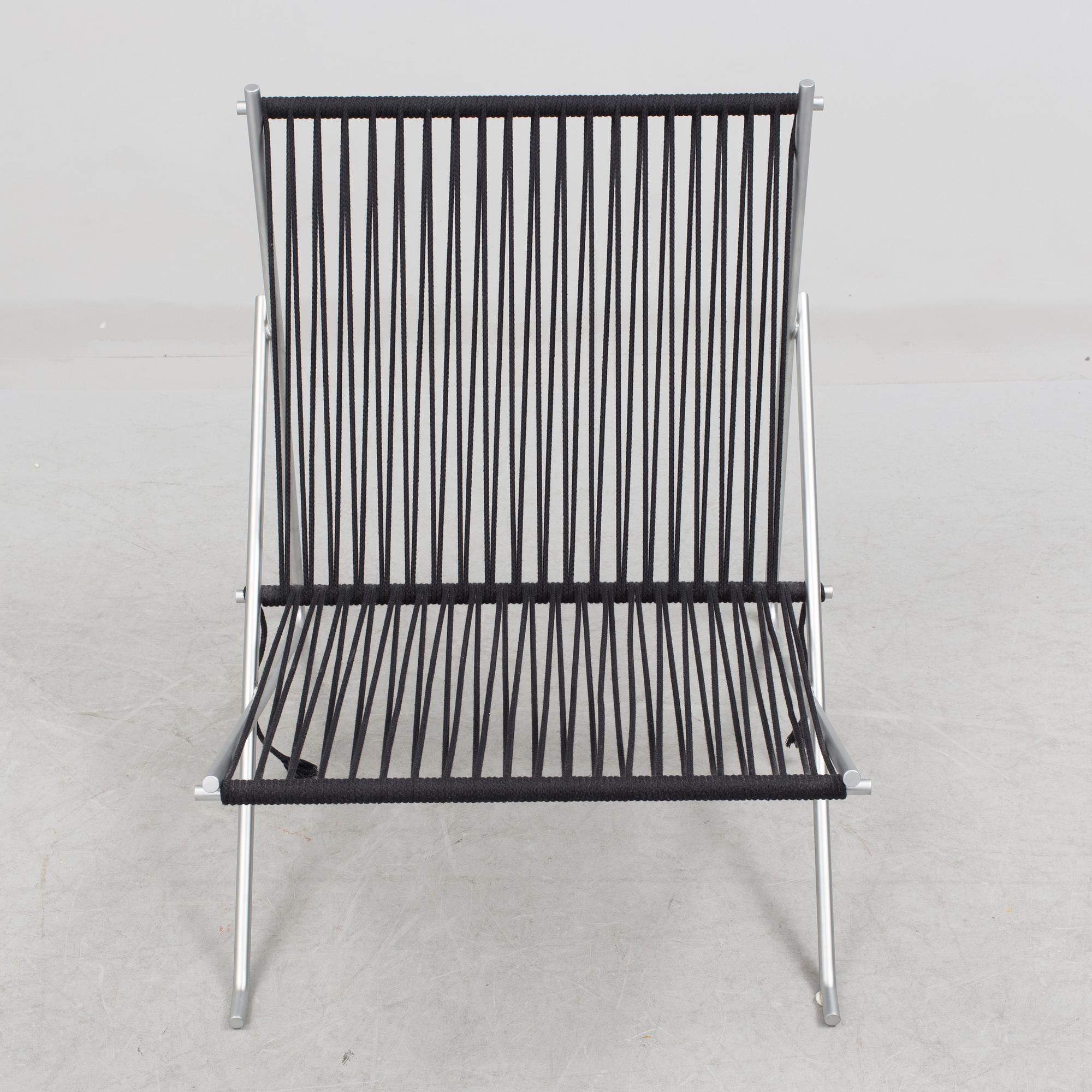 A "PK-4" chair by Poul Kjaerholm, Denmark.