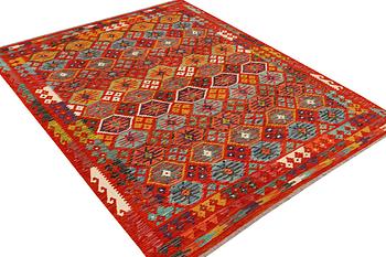 An Afghan kilim carpet, c. 257 x 202 cm.