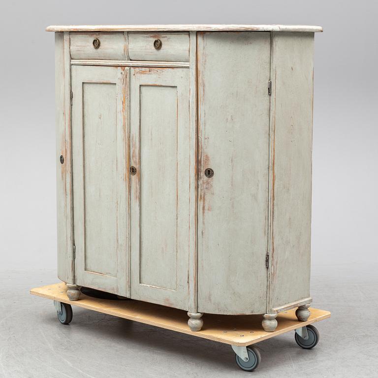 A mid 19th century painted cupboard.