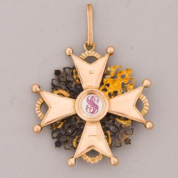 An imperial Russian gold and enamel order of Saint Stanislaus, third class, turn of the century 1900.