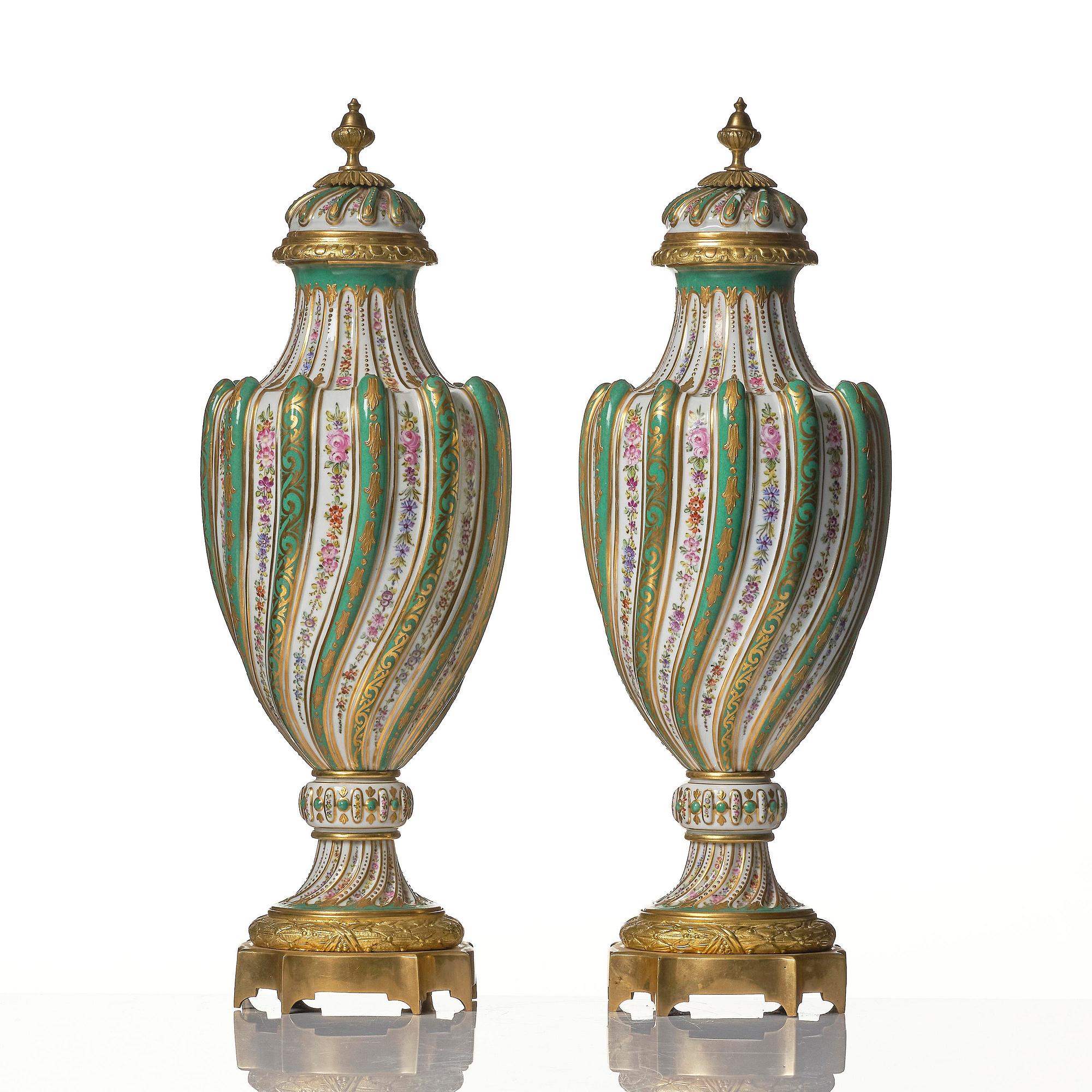 A pair of French 'Sèvres' porcelain urns, 1890s.