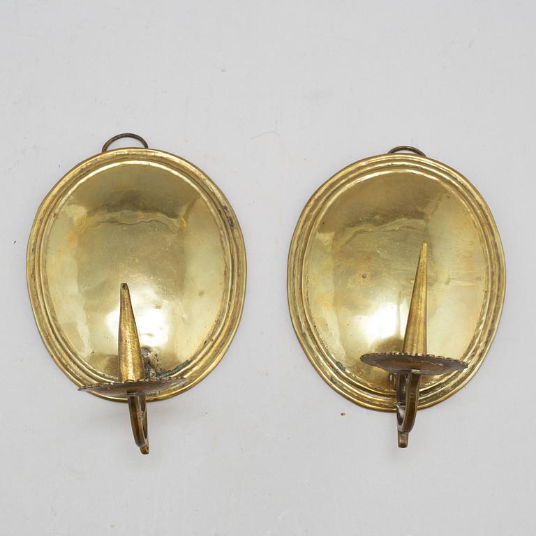 A pair of 18th century brass wall scones.