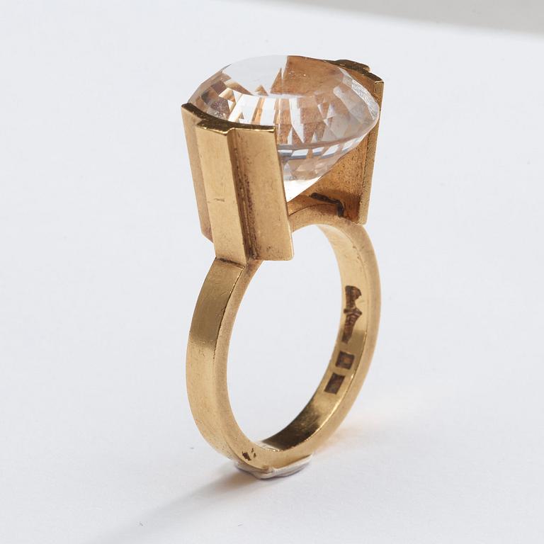 Wiwen Nilsson, a 18k gold ring with a facet cut rock crystal, Lund 1972.