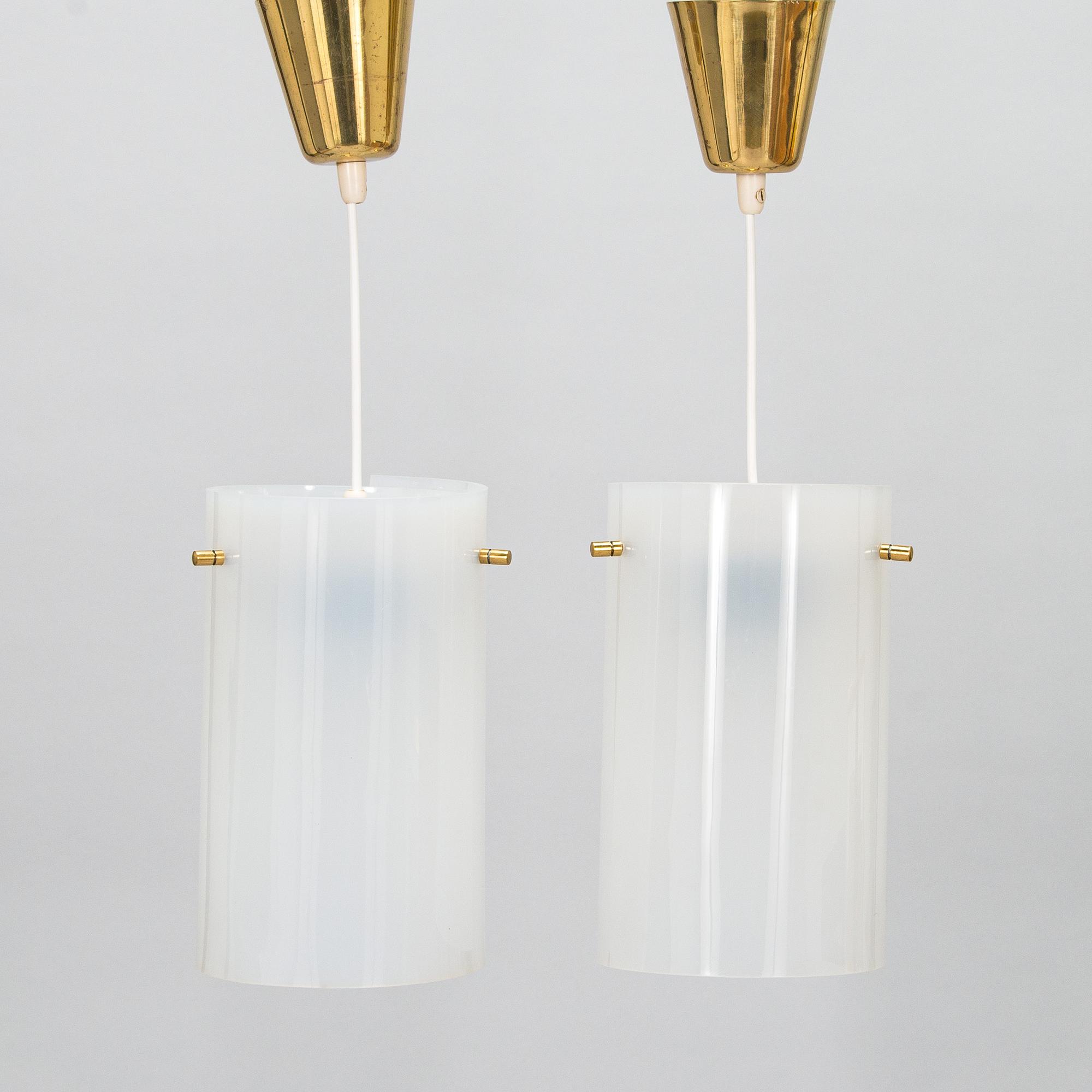 A pair of mid-20th century pendant lights for SO, Pohjoismainen Sähkö Oy, Finland.