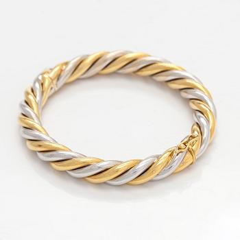 An 18K gold/white gold bracelet, Switzerland.