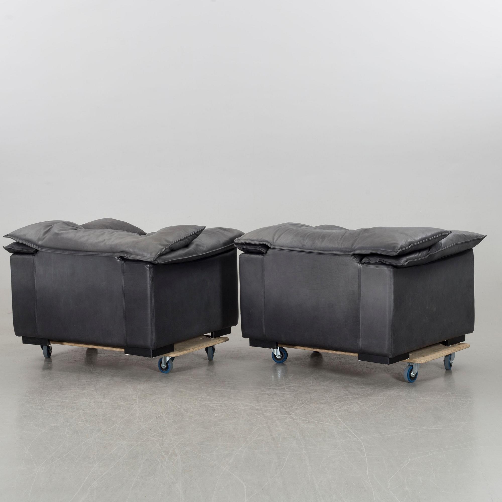 A PAIR OF "MONZA" LEATHER ARMCHAIRS BY EILERSEN.