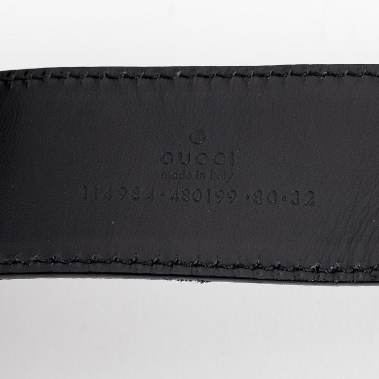 Gucci, a leather and textile belt, size 80.