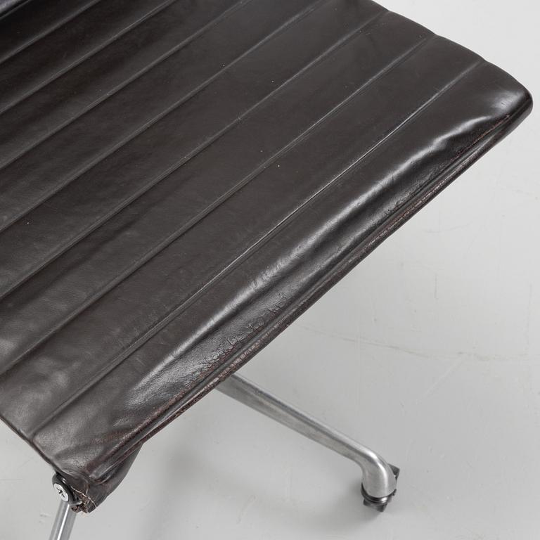 An EA 118 swivel office chair by  Charles and Ray Eames for Herman Miller, designed 1958.