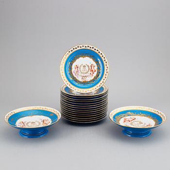 A set with two porcelain tazzas and 15 plates, France, "Sevrès", late 19th Century.
